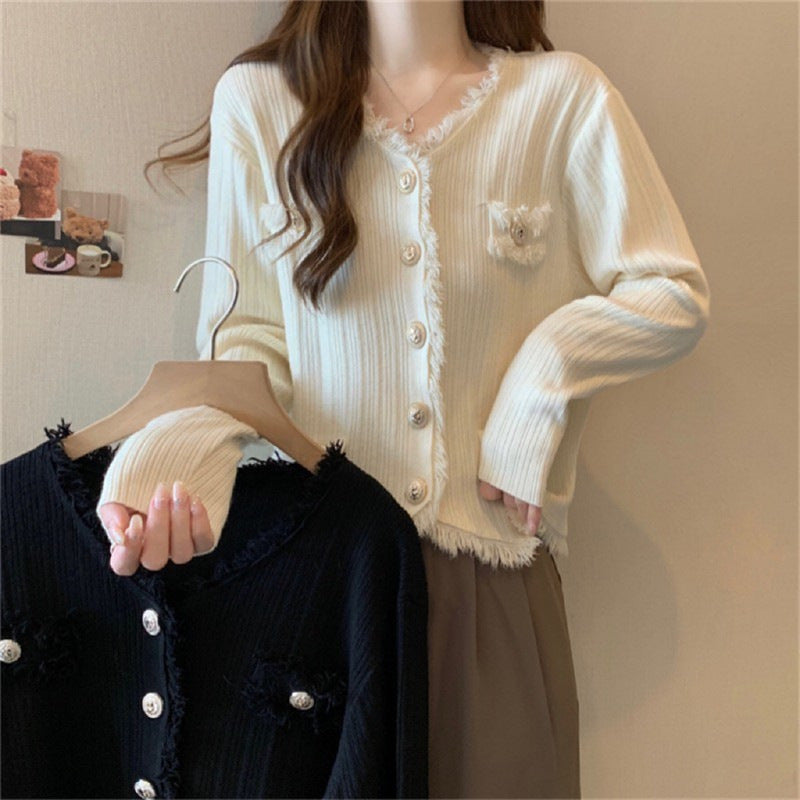 Women comfortable cardigan with subtle fringes and fashionable buttons