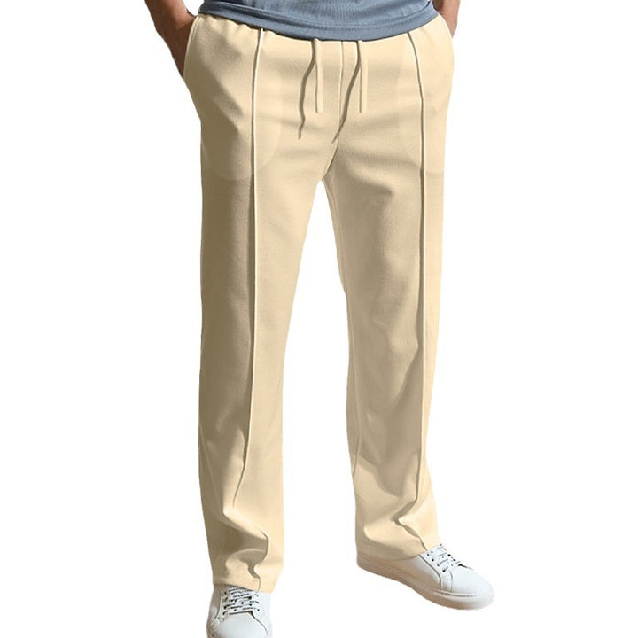 Men's leisure pants with elastic waistband and side snap buttons Lune London