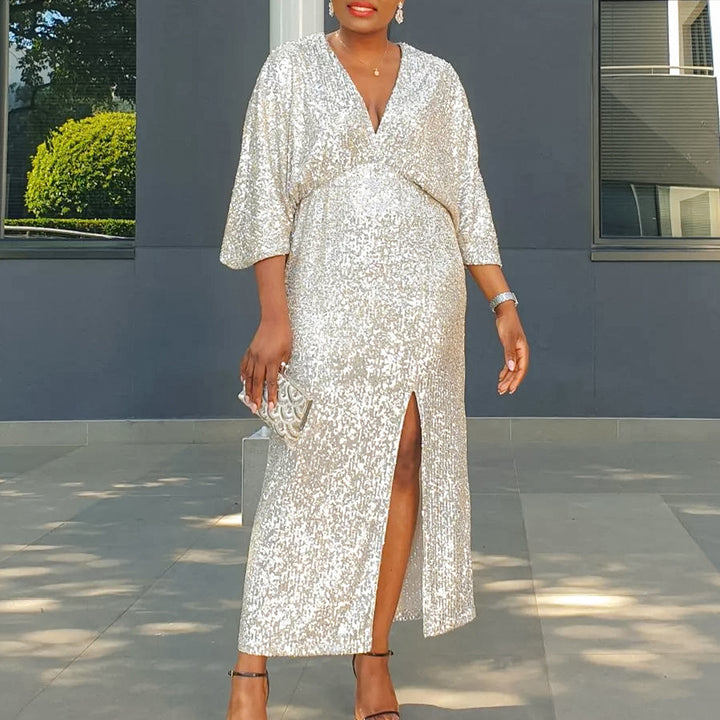 Sparkling evening dress for women with deep slit and luxurious puff sleeves Lune London