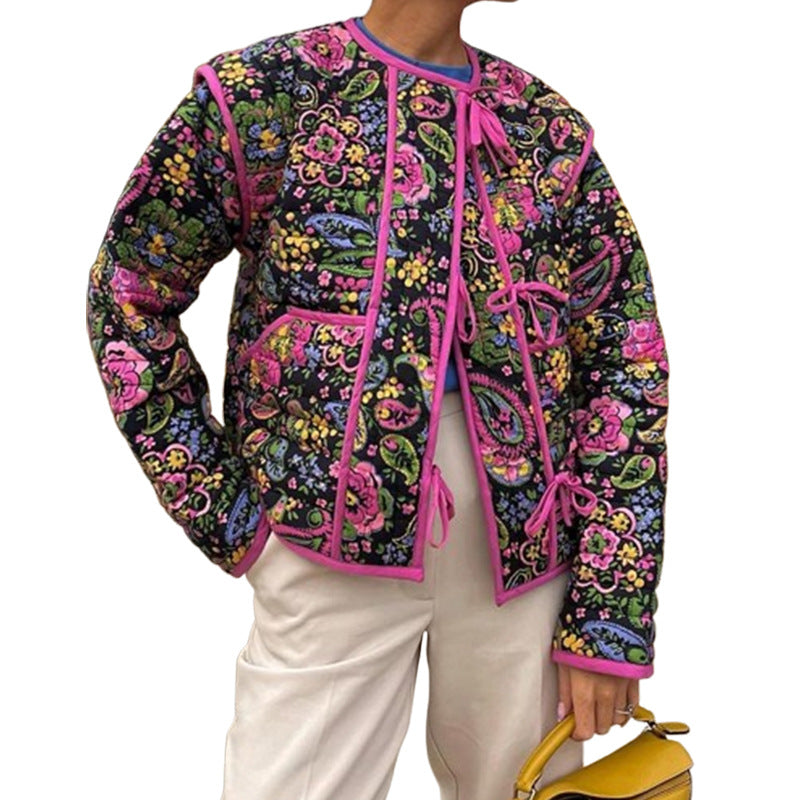 Ladies trendy quilted jacket with floral pattern and practical pockets Lune London