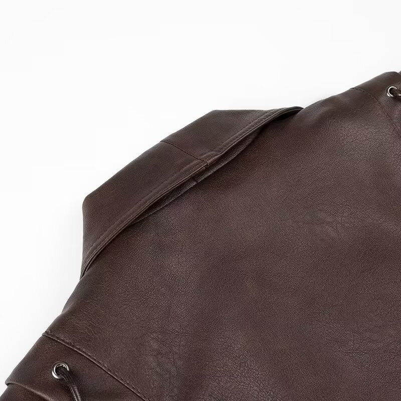 Ladies elegant faux leather jacket with adjustable belt and decorative lace details Lune London