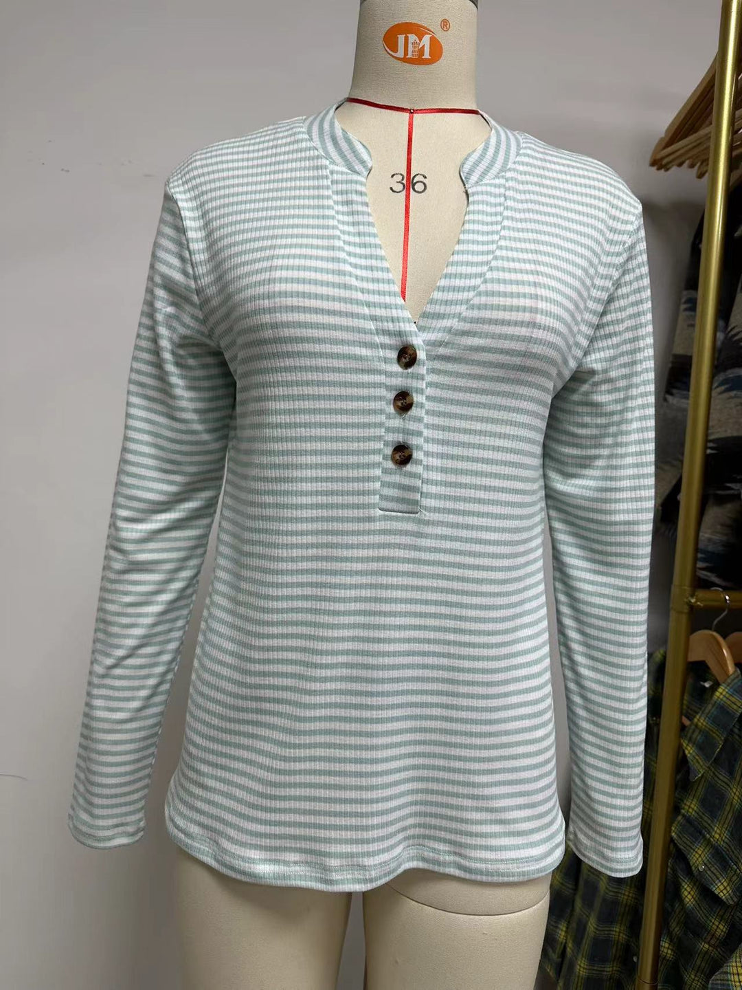 Long sleeve women's t-shirt with button placket and textured surface Lune London