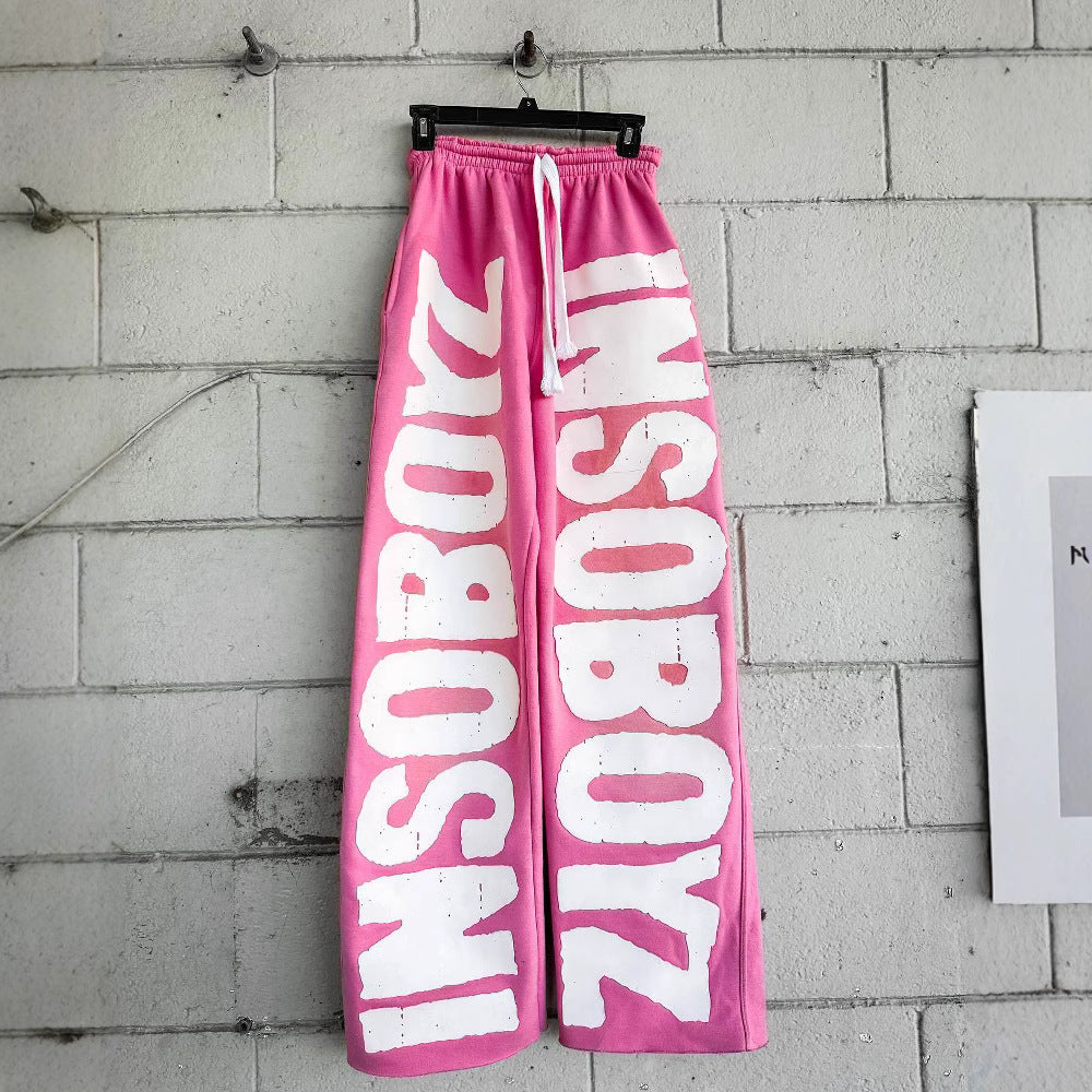 Women's casual pants with trendy statement print Chic & Stil