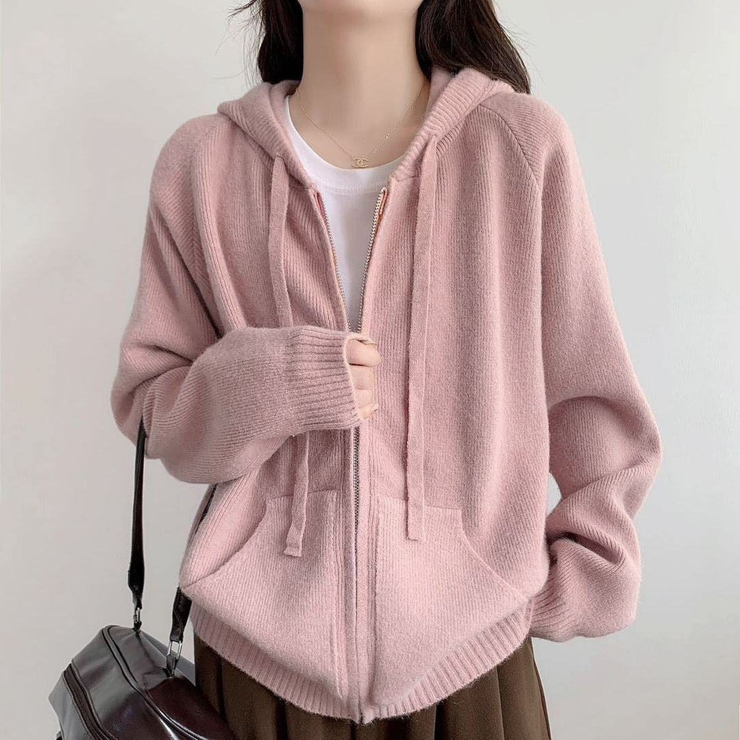 Veste à capuche pour femmes surdimensionnée avec une coupe courte et des poches pratiques Chic & Stil