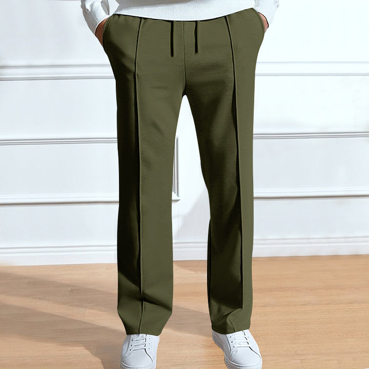 Men's leisure pants with elastic waistband and side snap buttons Lune London