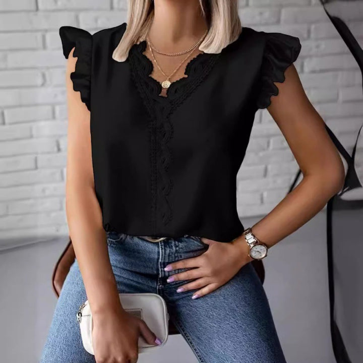 Women's blouse with ruffle details and lace appliqués Lune London