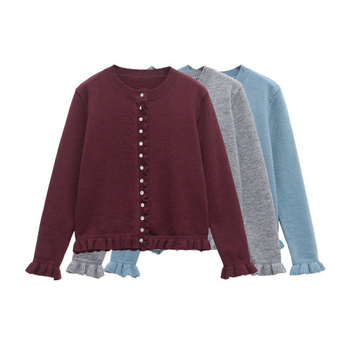 Casual knit jacket for women with ruffle details and a button closure Lune London