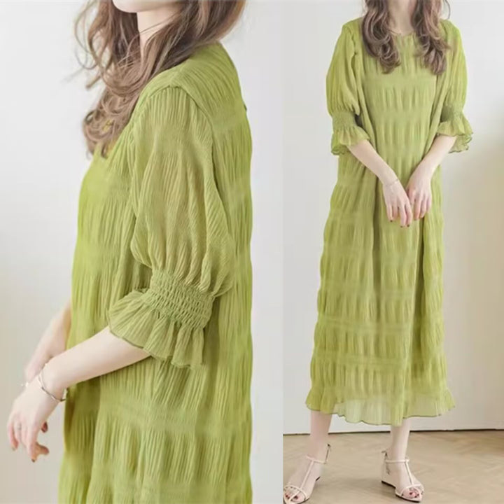 Casual maxi dress for women with elastic puff sleeves and a refined textured design Lune London