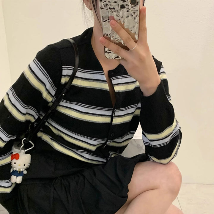 Sporty knitted jacket for women with a trendy striped pattern and playful buttons Lune London