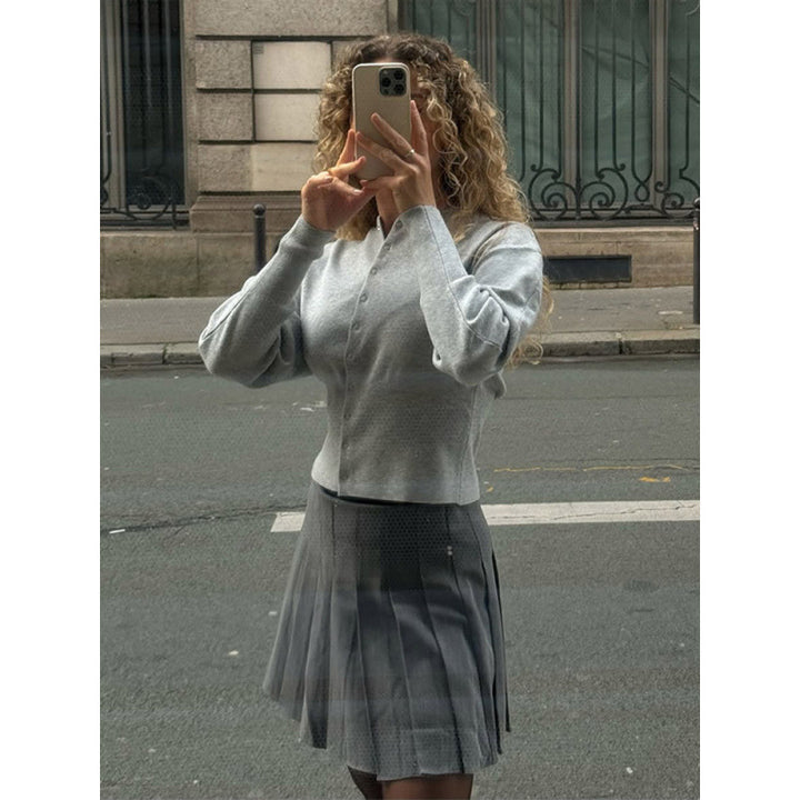 Trendy knit jacket for women with pleated sleeves and chic and stylish button details