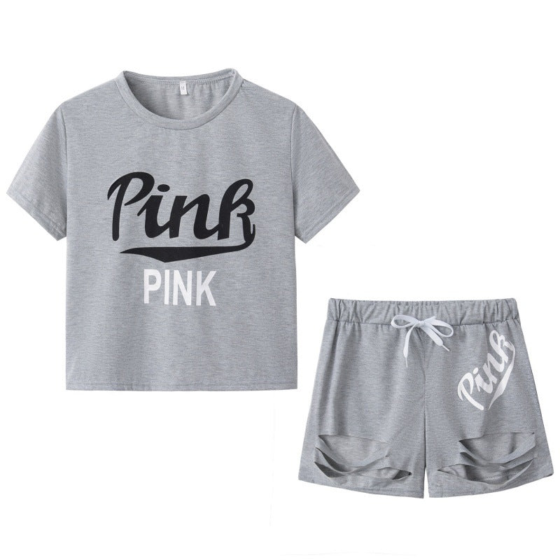 Ensemble t-shirt et short pour femmes sportif avec coupe décontractée et imprimés contrastés Chic & Stil