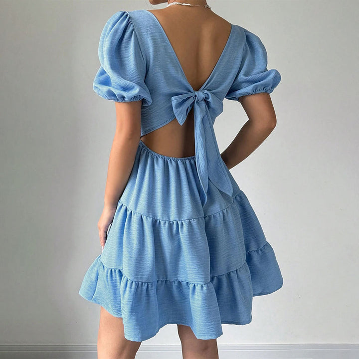 Robe pour femmes avec manches bouffantes et ourlet à volants Chic & Stil