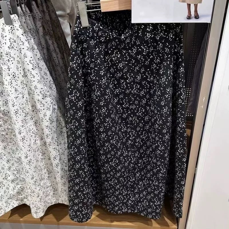 Jupe midi femme avec taille élastique et poches latérales Chic & Stil