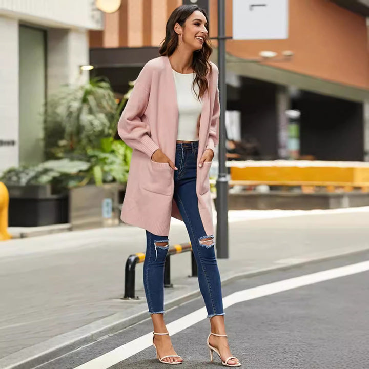 Ladies chunky knit kimono cardigan with open sleeves and practical pockets Lune London
