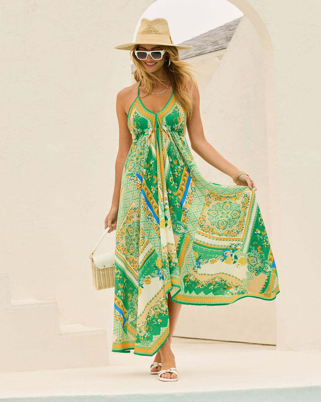 Boho-inspired maxi dress for women with an elegant V-neck and an asymmetrical hem Chic & Stil