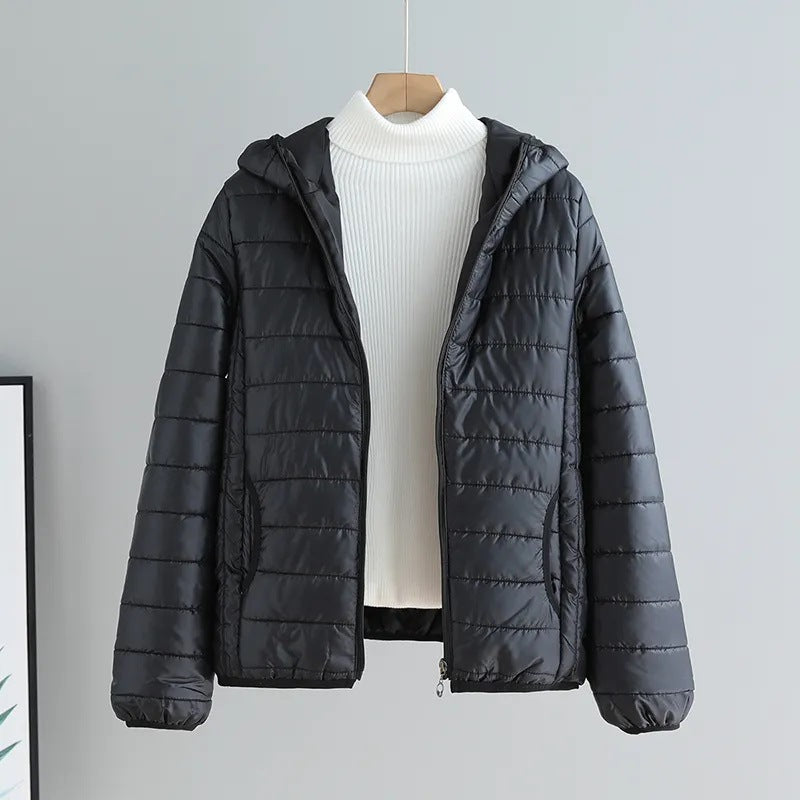 Ladies quilted transitional jacket with practical pockets and hood Lune London