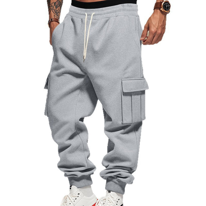 Men's cargo joggers with side pockets and elastic waistband. Chic and style.