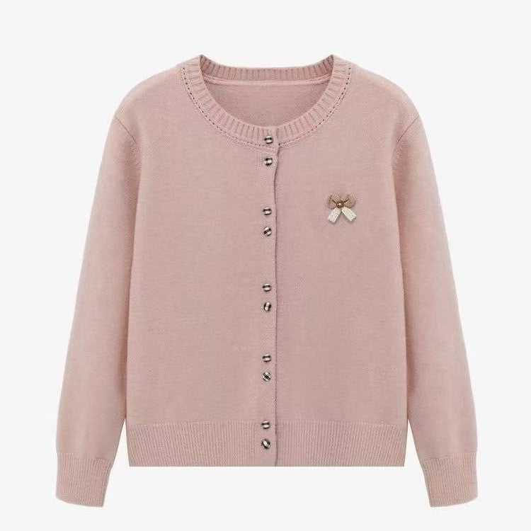 Ladies comfortable knitted cardigan with shiny buttons and decorative application Lune London