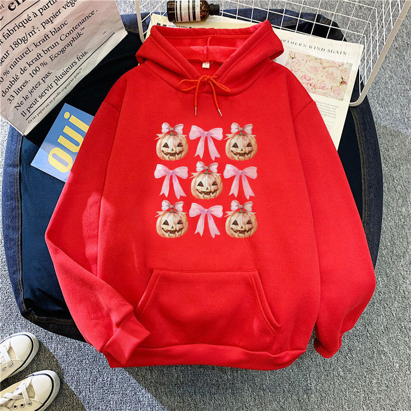 Women's Hoodie with Cheerful Pumpkin Design Chic & Stil