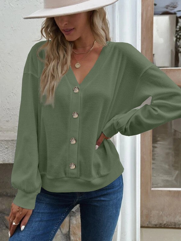 Ladies casual knitted jacket with chic button placket and style