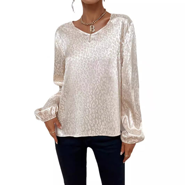 Blouse élégante pour femmes avec col en V et manches volumineuses Chic & Stil