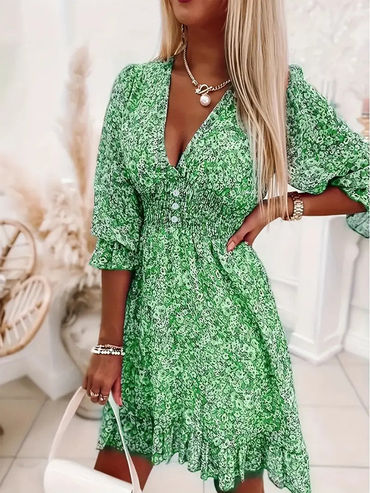 Ladies Mini dress playful and elegant with deep V-neckline and ruffle details Lune London