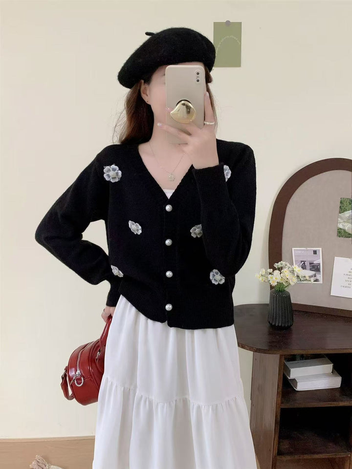 Ladies cozy knit vest with flower embroidery and pearl buttons Lune London