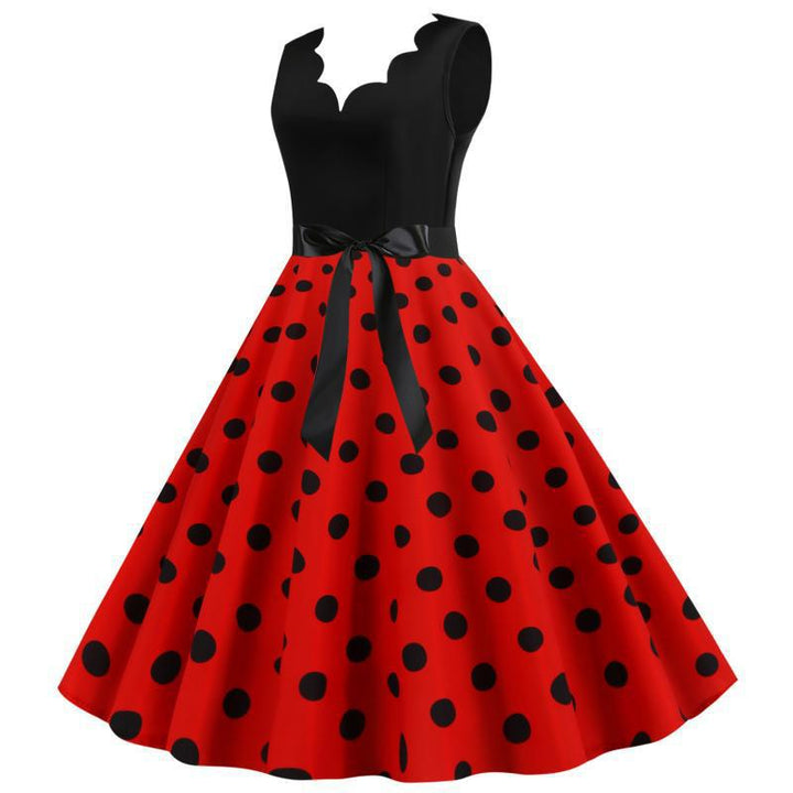Robe swing femme avec un design moderne à pois et un élégant col en V Chic & Stil