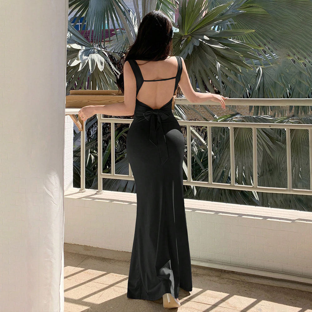Elegant evening dress for women with refined back cutouts and decorative tie belt Chic & Stil