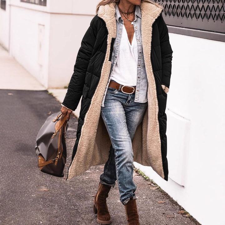 Winter coat for women in a casual oversized style with hood and side pockets Lune London