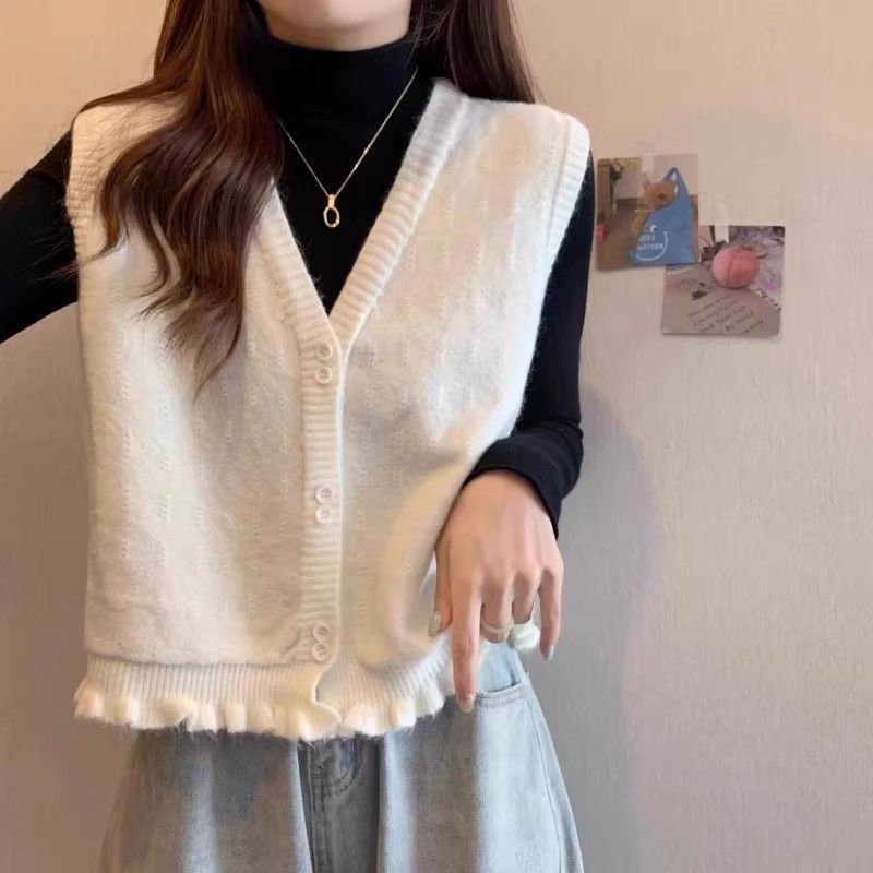 Gilet en tricot pour femme avec ourlet à volants ludiques Chic & Stil