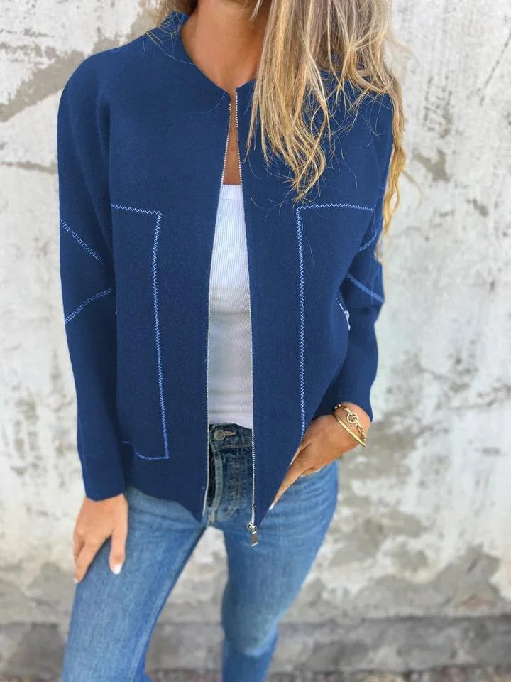 Ladies' knit jacket with stylish zipper details and a fine textured pattern Lune London