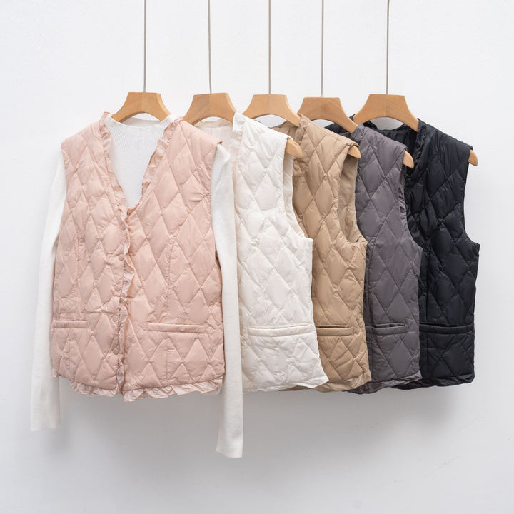 Ladies quilted vest with asymmetrical cut Lune London