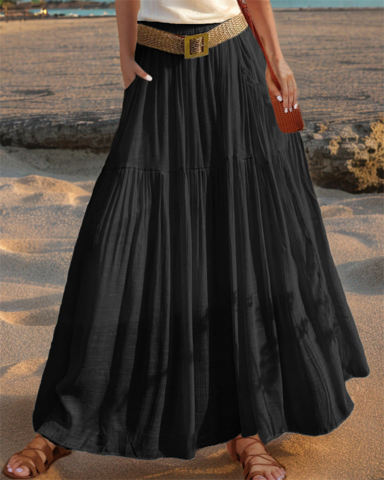 Maxi flared skirt for women with elegant pleated draping and practical pockets Lune London