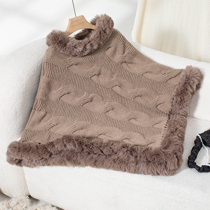 Ladies cozy poncho sweater with soft faux fur trim and cable knit pattern Lune London