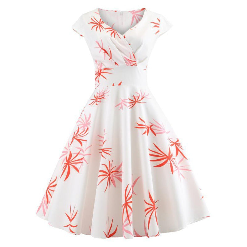 Robe à swing pour femmes avec un design enveloppant élégant et des accents floraux Chic & Stil