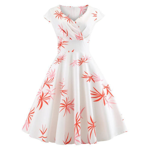 Robe à swing pour femmes avec un design enveloppant élégant et des accents floraux Chic & Stil