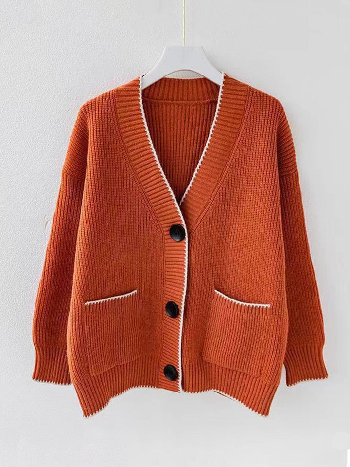 Ladies thick knit cardigan with deep V-neck and practical pockets Lune London