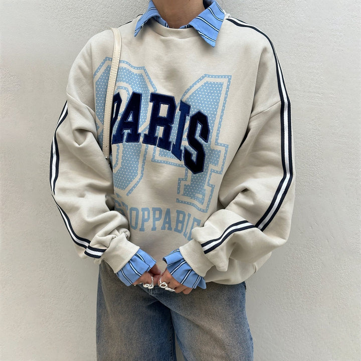 Oversized sweatshirt for women with Paris fashion print and striped accents Lune London
