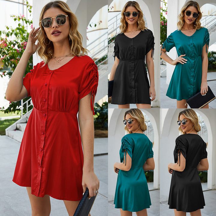 Summer dress with short sleeves for women with button detail and flounce hem Lune London