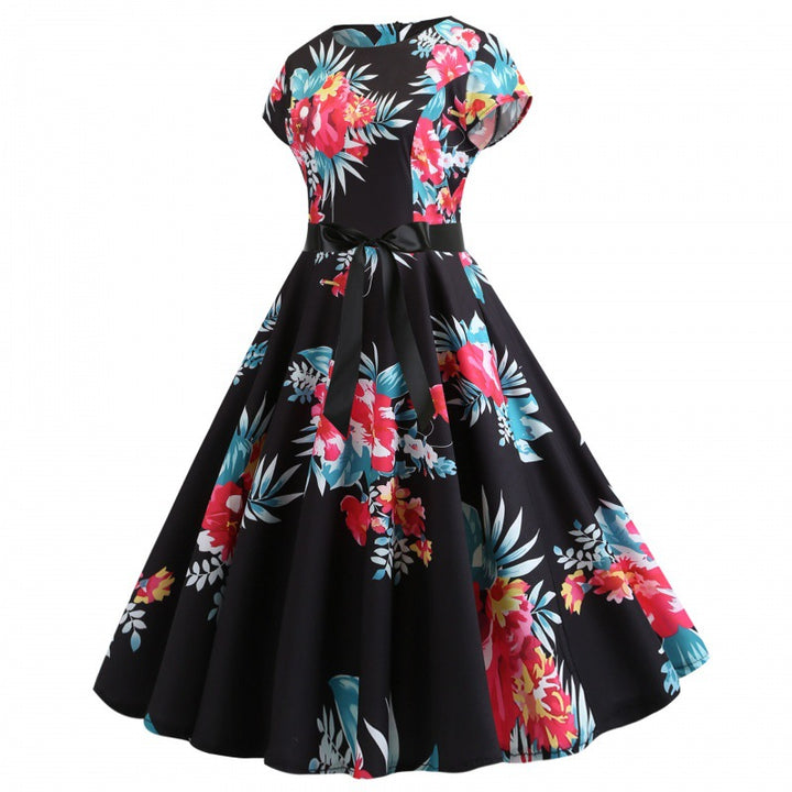 Robe midi femme avec design floral et coupe ajustée Chic & Stil