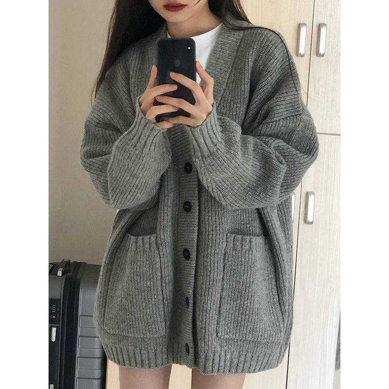 Ladies Large knitted cardigan with deep V-neck and practical pockets Lune London