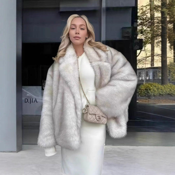 Ladies Elegant Synthetic Fur Jacket with Chic Sparkling Accents and Style