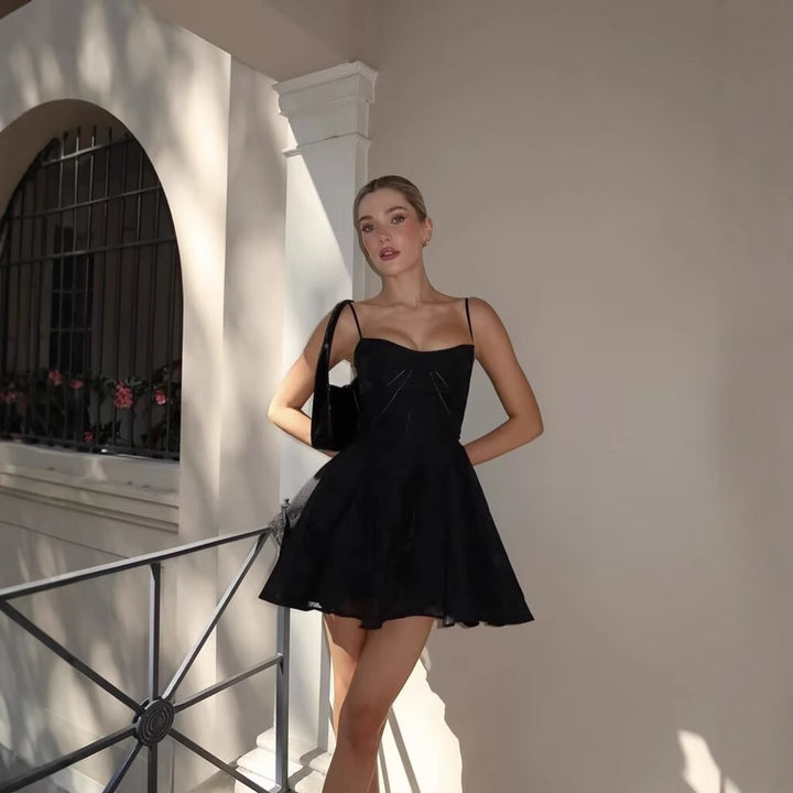 Ladies' dress with floral lace pattern and adjustable straps Lune London