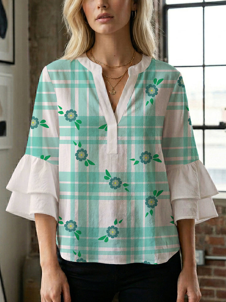 Women's blouse with voluminous wing sleeves and intense leaf pattern Lune London