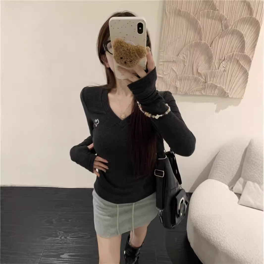Women's long-sleeve shirt with V-neck and elegant rib structures Chic & Stil