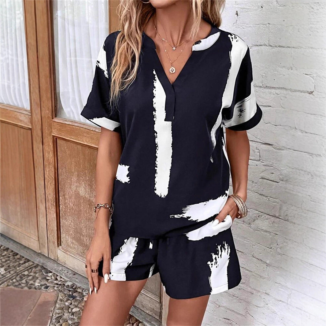 Summer jumpsuit for women with an elegant V-neck and practical pockets Lune London