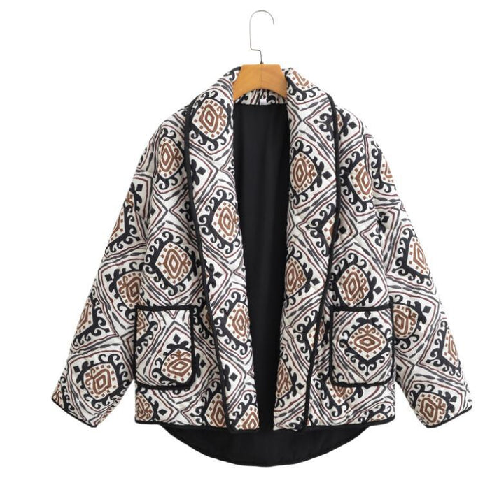 Veste matelassée élégante pour femmes avec ceinture à la taille et manches larges Chic & Stil