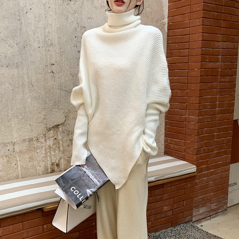 Knitted sweater for women with asymmetric cut and high collar Lune London