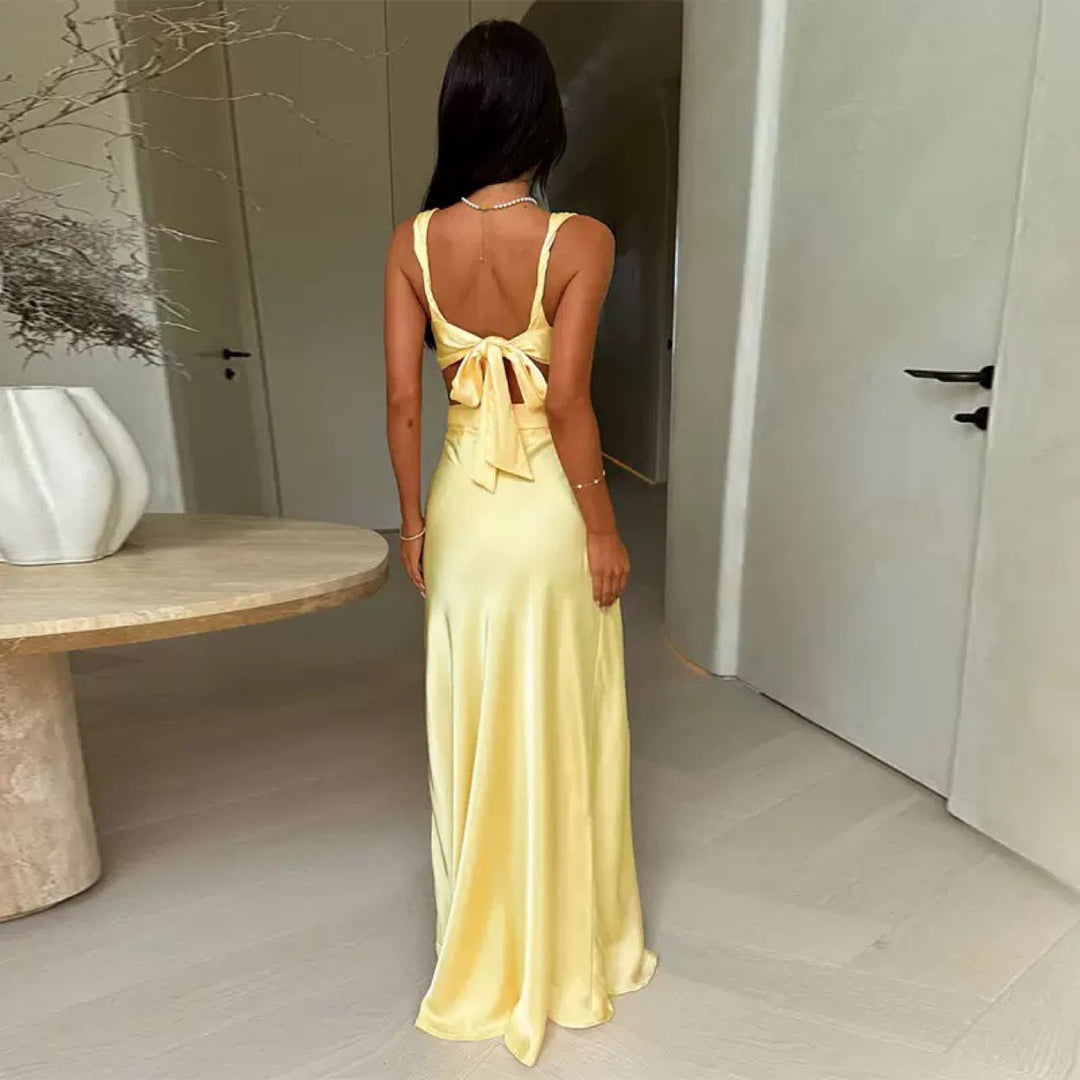 Women’s evening dress with deep V-neck and sophisticated cut-out details Lune London